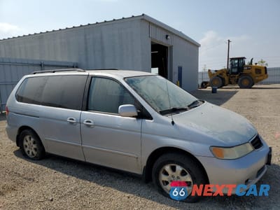 Czwarte zdjęcie samochodu z boku: 2000 HONDA ODYSSEY EX VIN:5FNRL18612B044056 - miniatura
