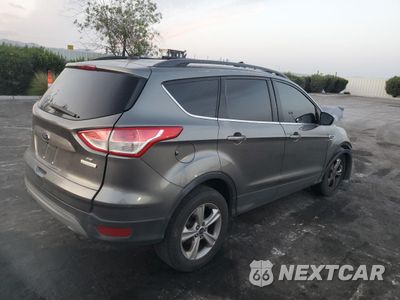 Trzecie zdjęcie samochodu z tyłu: 2014 FORD ESCAPE SE VIN:1FMCU0GX6EUC01997 - miniatura