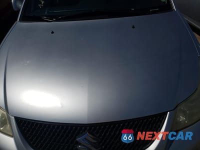 Zdjęcie 11 z 12 samochodu: 2013 SUZUKI SX4 LE VIN:JS2YC5A35D6101897 - miniatura