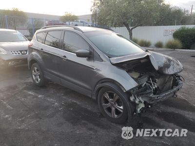 Czwarte zdjęcie samochodu z boku: 2014 FORD ESCAPE SE VIN:1FMCU0GX6EUC01997 - miniatura