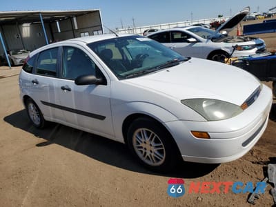 Czwarte zdjęcie samochodu z boku: 2003 FORD FOCUS ZX5 VIN:3FAFP37333R146054 - miniatura