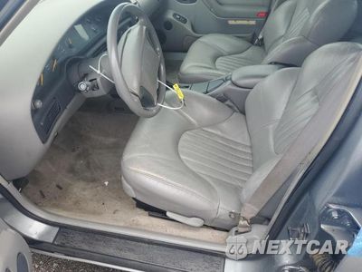 Zdjęcie 7 z 12 samochodu: 1993 PONTIAC BONNEVILLE SE VIN:1G2HX53L2P1272186 - miniatura