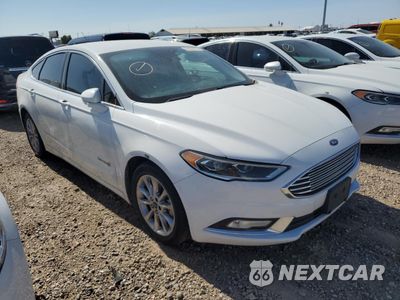 Czwarte zdjęcie samochodu z boku: 2017 FORD FUSION SE HYBRID VIN:3FA6P0LU2HR409137 - miniatura