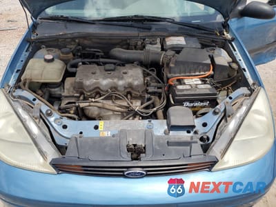 Zdjęcie 11 z 13 samochodu: 2001 FORD FOCUS LX VIN:1FAFP33P51W122583 - miniatura