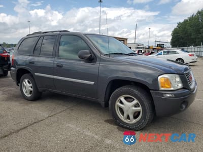 Czwarte zdjęcie samochodu z boku: 2007 GMC ENVOY VIN:1GKDS13SX72177351 - miniatura