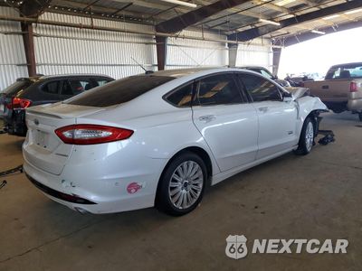 Trzecie zdjęcie samochodu z tyłu: 2014 FORD FUSION TITANIUM PHEV VIN:3FA6P0SU1ER255999 - miniatura