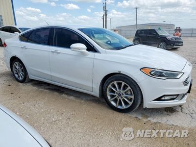 Czwarte zdjęcie samochodu z boku: 2017 FORD FUSION SE HYBRID VIN:3FA6P0LU7HR409036 - miniatura