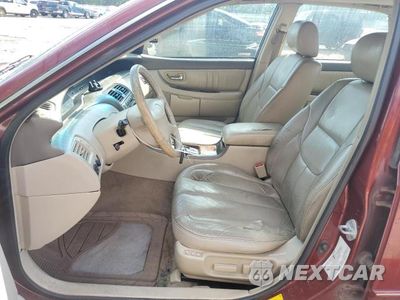 Zdjęcie 7 z 12 samochodu: 2000 TOYOTA AVALON XL VIN:4T1BF28B3YU005038 - miniatura