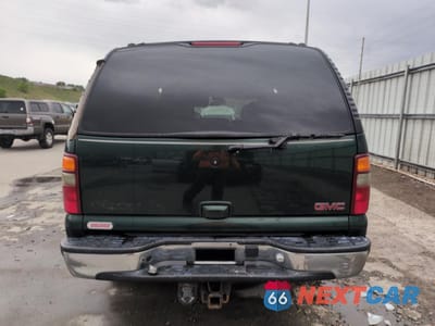 Zdjęcie 6 z 13 samochodu: 2001 GMC YUKON XL K1500 VIN:3GKFK16T21G258677 - miniatura