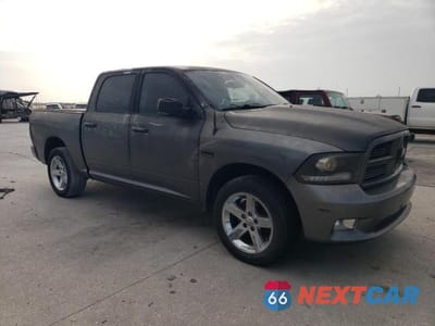 Czwarte zdjęcie samochodu z boku: 2012 DODGE RAM 1500 SPORT VIN:1C6RD6MT7CS149203 - miniatura