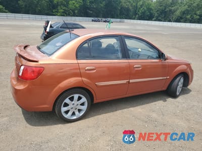 Trzecie zdjęcie samochodu z tyłu: 2010 KIA RIO LX VIN:KNADH4A36A6674417 - miniatura