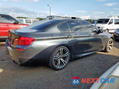 Czwarte zdjęcie samochodu z boku: 2013 BMW M5 VIN:WBSFV9C5XDD096847 - miniatura
