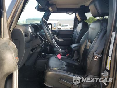 Zdjęcie 7 z 15 samochodu: 2014 JEEP WRANGLER UNLIMITED SAHARA VIN:1C4HJWEG9EL240338 - miniatura