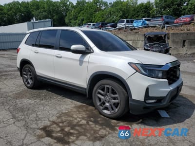 Czwarte zdjęcie samochodu z boku: 2023 HONDA PASSPORT EXL VIN:5FNYF8H55PB010292 - miniatura