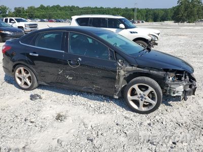 Czwarte zdjęcie samochodu z boku: 2014 FORD FOCUS TITANIUM VIN:1FADP3J26EL123781 - miniatura