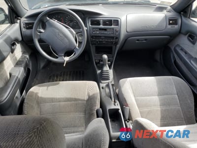 Zdjęcie 8 z 12 samochodu: 1995 TOYOTA COROLLA LE VIN:2T1AE09B9SC125940 - miniatura