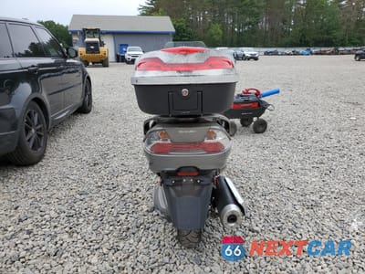 Czwarte zdjęcie samochodu z boku: 2011 SUZUKI AN400 A VIN:JS1CK44B4B2100100 - miniatura