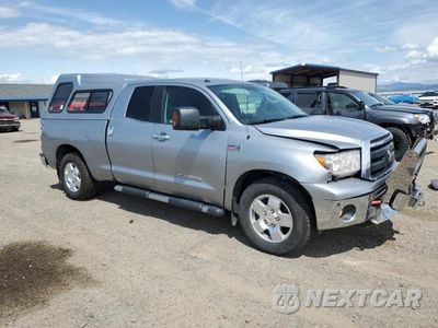 Czwarte zdjęcie samochodu z boku: 2011 TOYOTA TUNDRA DOUBLE CAB SR5 VIN:5TFUY5F15BX208702 - miniatura