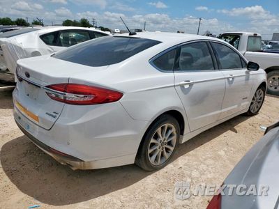Trzecie zdjęcie samochodu z tyłu: 2017 FORD FUSION SE HYBRID VIN:3FA6P0LU6HR409058 - miniatura