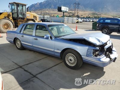 Czwarte zdjęcie samochodu z boku: 1995 LINCOLN TOWN CAR SIGNATURE VIN:1LNLM82W4SY618651 - miniatura