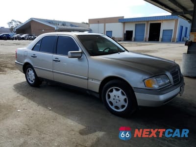 Czwarte zdjęcie samochodu z boku: 1997 MERCEDES-BENZ C 280 VIN:WDBHA28E8VF611344 - miniatura