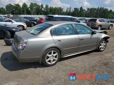Trzecie zdjęcie samochodu z tyłu: 2002 NISSAN ALTIMA SE VIN:1N4BL11EX2C715570 - miniatura