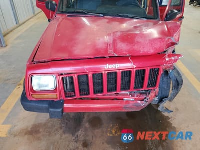 Zdjęcie 12 z 15 samochodu: 2000 JEEP CHEROKEE SPORT VIN:1J4FF48S9YL226838 - miniatura