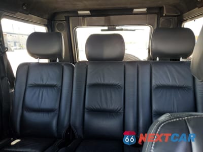 Zdjęcie 10 z 13 samochodu: 2005 MERCEDES-BENZ G 55 AMG VIN:WDCYR71E95X163346 - miniatura