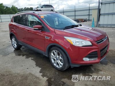 Czwarte zdjęcie samochodu z boku: 2016 FORD ESCAPE TITANIUM VIN:1FMCU0J94GUC06001 - miniatura