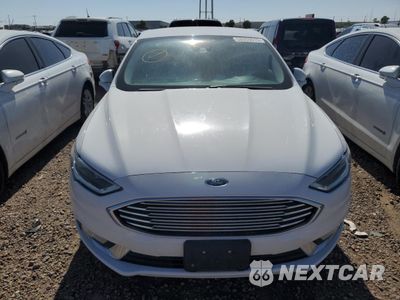 Piąte zdjęcie samochodu w środku: 2017 FORD FUSION SE HYBRID VIN:3FA6P0LU2HR409137 - miniatura