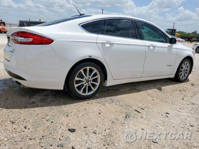 Trzecie zdjęcie samochodu z tyłu: 2017 FORD FUSION SE HYBRID VIN:3FA6P0LU2HR409042 - miniatura