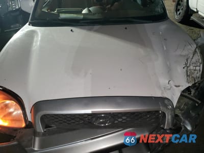 Zdjęcie 11 z 12 samochodu: 2004 HYUNDAI SANTA FE GLS VIN:KM8SC13E84U713106 - miniatura