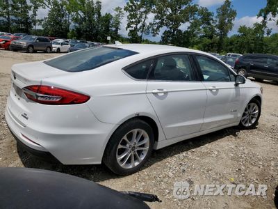 Trzecie zdjęcie samochodu z tyłu: 2019 FORD FUSION SE VIN:3FA6P0LU7KR285129 - miniatura
