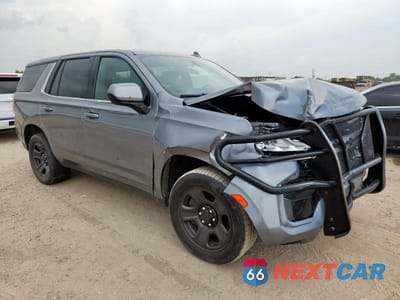 Czwarte zdjęcie samochodu z boku: 2021 CHEVROLET TAHOE C1500 VIN:1GNSCLED7MR396269 - miniatura