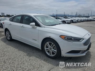 Czwarte zdjęcie samochodu z boku: 2018 FORD FUSION SE HYBRID VIN:3FA6P0LU5JR278727 - miniatura