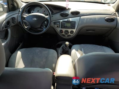 Zdjęcie 8 z 12 samochodu: 2003 FORD FOCUS ZX5 VIN:3FAFP37333R146054 - miniatura
