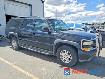 Czwarte zdjęcie samochodu z boku: 2003 CHEVROLET SUBURBAN K1500 VIN:3GNFK16T83G187622 - miniatura