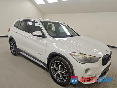 Czwarte zdjęcie samochodu z boku: 2018 BMW X1 SDRIVE28I VIN:WBXHU7C38J5H39715 - miniatura
