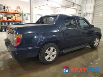 Trzecie zdjęcie samochodu z tyłu: 2009 HONDA RIDGELINE RTL VIN:2HJYK16559H500732 - miniatura