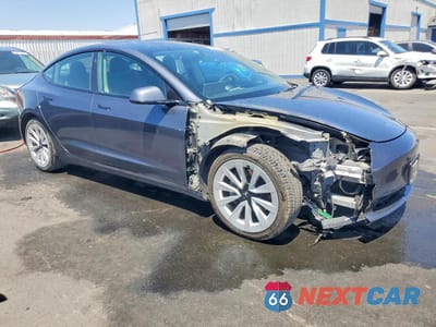 Czwarte zdjęcie samochodu z boku: 2022 TESLA MODEL 3 VIN:5YJ3E1EB1NF289767 - miniatura
