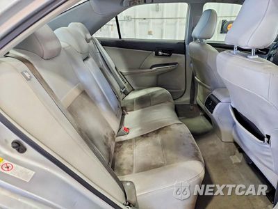 Zdjęcie 10 z 12 samochodu: 2012 TOYOTA CAMRY HYBRID XLE VIN:4T1BD1FK7CU036112 - miniatura