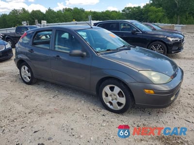 Czwarte zdjęcie samochodu z boku: 2004 FORD FOCUS ZX5 VIN:3FAFP37Z84R110902 - miniatura