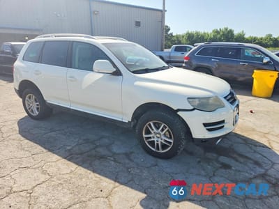 Czwarte zdjęcie samochodu z boku: 2009 VOLKSWAGEN TOUAREG 2 V6 VIN:WVGBE77L59D015999 - miniatura