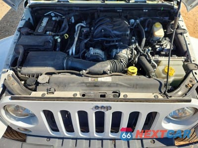 Zdjęcie 11 z 12 samochodu: 2015 JEEP WRANGLER UNLIMITED SAHARA VIN:1C4BJWEG8FL573444 - miniatura