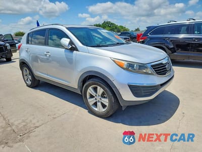 Czwarte zdjęcie samochodu z boku: 2012 KIA SPORTAGE LX VIN:KNDPB3A28C7261057 - miniatura