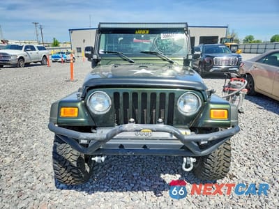Piąte zdjęcie samochodu w środku: 2005 JEEP WRANGLER X VIN:1J4FA39S75P309888 - miniatura