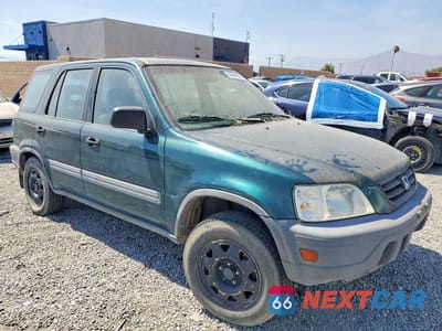Czwarte zdjęcie samochodu z boku: 1999 HONDA CR-V LX VIN:JHLRD1844XC020000 - miniatura
