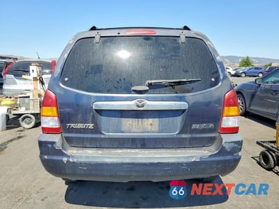 Zdjęcie 6 z 13 samochodu: 2004 MAZDA TRIBUTE DX VIN:4F2YZ02B34KM03925 - miniatura