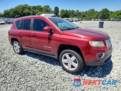 Czwarte zdjęcie samochodu z boku: 2014 JEEP COMPASS LATITUDE VIN:1C4NJCEA2ED887011 - miniatura
