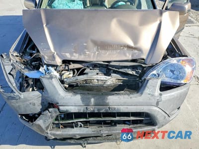 Zdjęcie 11 z 12 samochodu: 2004 HONDA CR-V EX VIN:JHLRD78864C040475 - miniatura